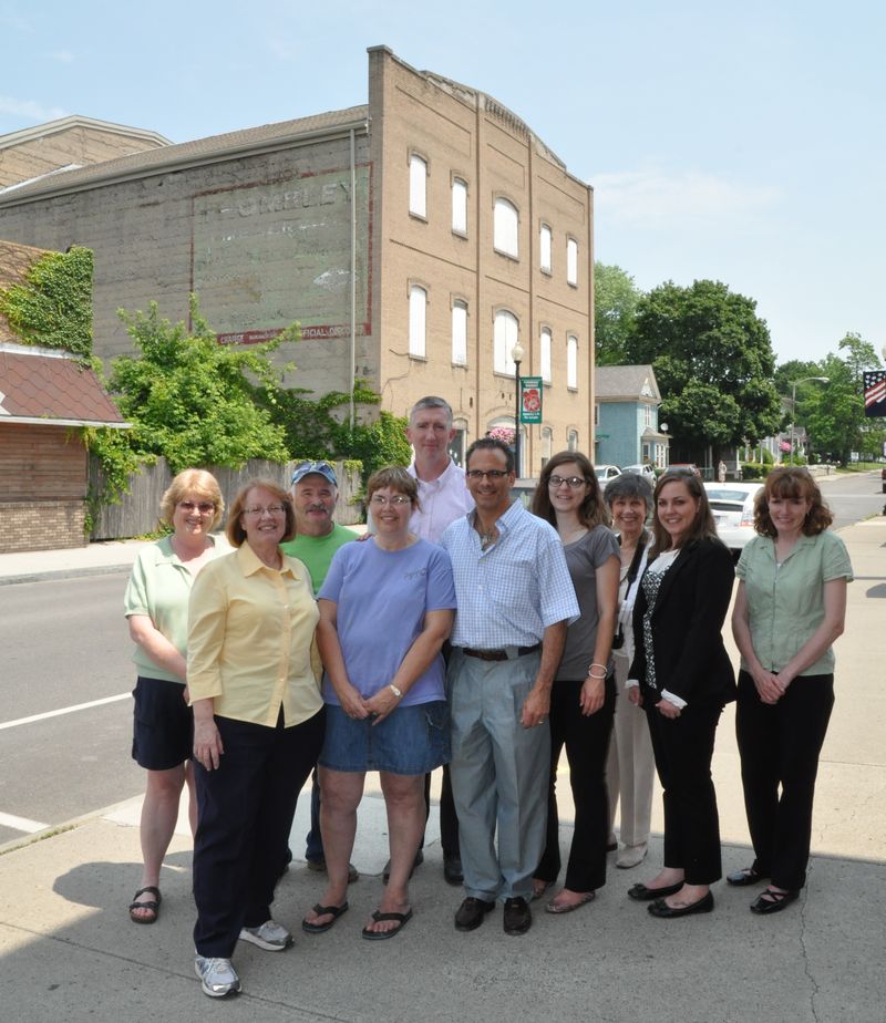 Local preservationists and Landmark Society staff in front of the Sampson Theater, a 2013 Five to Revive property.