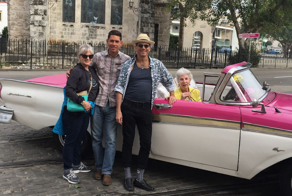 Landmark Society tour goers and Ramses, their Cuban vintage car driver, head out for a short driving tour before leaving Havana to return home.