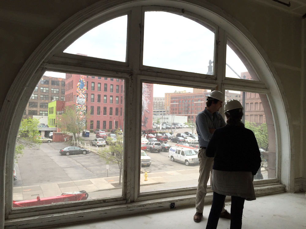 Wide arched windows to admit natural light onto the factory floor now provide residents unparalleled views day and night.